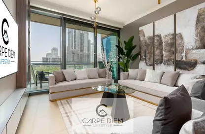 Living Room image for: Apartment - 2 Bedrooms - 3 Bathrooms for rent in Burj Vista 2 - Burj Vista - Downtown Dubai - Dubai, Image 1