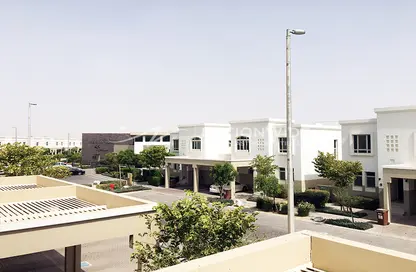 Outdoor House image for: Townhouse - 2 Bedrooms - 2 Bathrooms for sale in Waterfall District - Al Ghadeer - Abu Dhabi, Image 1