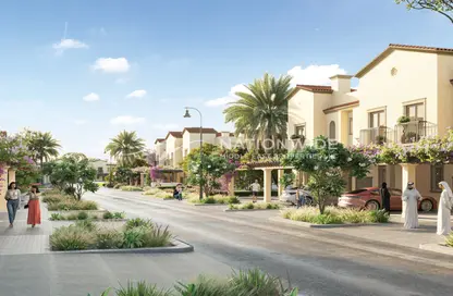 Outdoor Building image for: Townhouse - 2 Bedrooms - 3 Bathrooms for sale in Bloom Living - Zayed City (Khalifa City C) - Khalifa City - Abu Dhabi, Image 1
