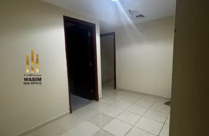 شقة - غرفة نوم - 2 حمامات للايجار في أورينت تاور 1 - أورينت تاور - البستان - عجمان