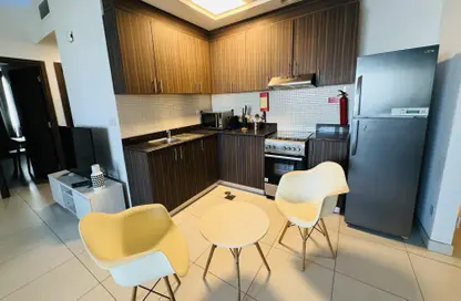 صورة لـ مطبخ شقة - 2 غرف نوم - 2 حمامات للايجار في اقامة وندسور - دبي لاند - دبي ، صورة رقم 1