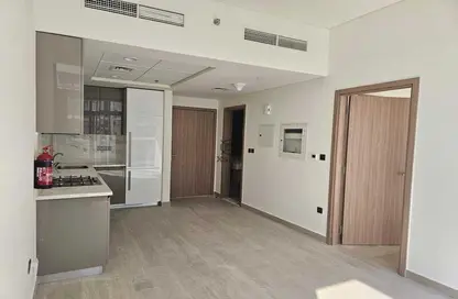 صورة لـ مطبخ شقة - غرفة نوم - 1 حمام للايجار في عزيزي ريفيرا - ميدان واحد - ميدان - دبي ، صورة رقم 1