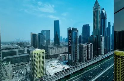 طابق كامل - استوديو - 4 حمامات للايجار في أبراج الموسى - شارع الشيخ زايد - دبي
