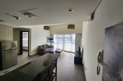 Living / Dining Room image for: Apartment - 1 Bedroom - 1 Bathroom for rent in The Bridge - Dubai Sports City - Dubai, Image 1