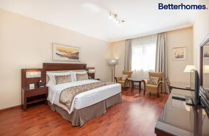 شقة - غرفة نوم - 2 حمامات للايجار في فندق جراند ميلينيوم - دبي - برشا هايتس (تيكوم) - دبي