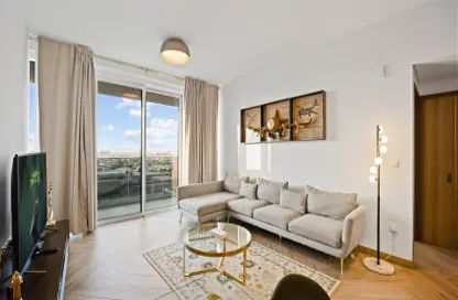 Living Room image for: Apartment - 1 Bedroom - 1 Bathroom for rent in 1 Residences - Wasl1 - Al Kifaf - Dubai, Image 1