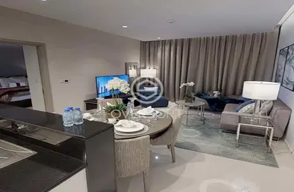 Living / Dining Room image for: Apartment - 2 Bedrooms - 3 Bathrooms for sale in Aykon City - Business Bay - Dubai, Image 1