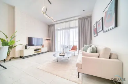 Living Room image for: Apartment - 1 Bedroom - 1 Bathroom for rent in Hameni Tower - Jumeirah Village Circle - Dubai, Image 1
