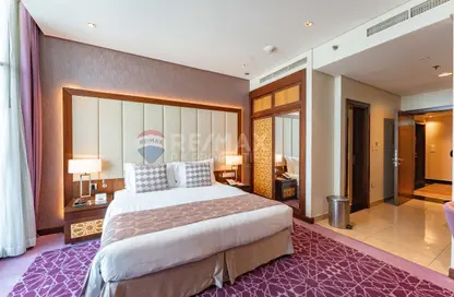 Apartment - Studio - 1 Bathroom for rent in Royal Continental Suites - Business Bay - Dubai