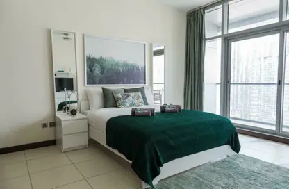 Room / Bedroom image for: Apartment - 1 Bathroom for rent in Indigo Tower - Lake Almas East - Jumeirah Lake Towers - Dubai, Image 1