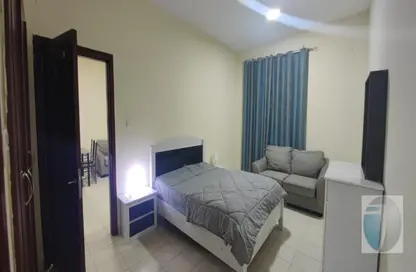 شقة - غرفة نوم - 2 حمامات للايجار في Z03 - طراز إنجليزي - المدينة الدولية - دبي