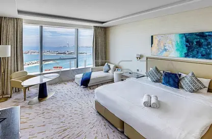 Room / Bedroom image for: Apartment - Studio - 1 Bathroom for rent in The Palm Tower - Palm Jumeirah - Dubai, Image 1