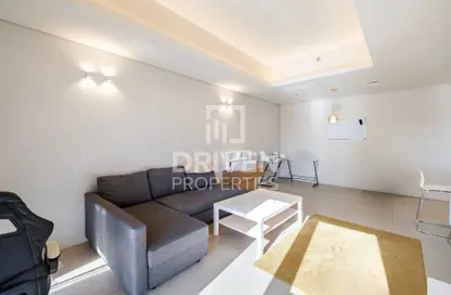 Living Room image for: Apartment - 2 Bedrooms - 3 Bathrooms for sale in Park View Tower - Jumeirah Village Circle - Dubai, Image 1