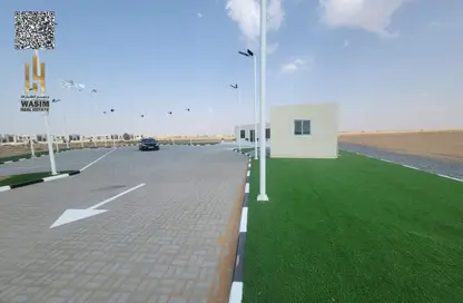 أرض - استوديو للبيع في بساتين السره - مشروع السرة السكني - أم القيوين