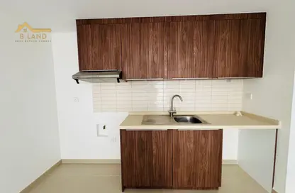 شقة - غرفة نوم - 1 حمام للايجار في أبتاون الزاهية - الزاهية - تجارية مويلح - الشارقة