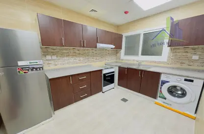 Kitchen image for: Apartment - 1 Bedroom - 2 Bathrooms for rent in Sheikh Jaber Al Sabah Street - Al Naimiya - Al Nuaimiya - Ajman, Image 1
