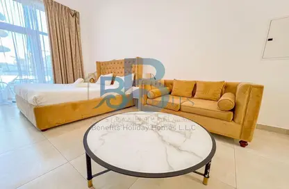 Living Room image for: Apartment - 1 Bathroom for rent in Pantheon Elysee - Jumeirah Village Circle - Dubai, Image 1