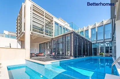 Pool image for: Villa - 5 Bedrooms - 6 Bathrooms for sale in Beach Villas - Al Zeina - Al Raha Beach - Abu Dhabi, Image 1