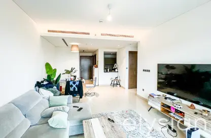 Living Room image for: Apartment - 1 Bedroom - 2 Bathrooms for sale in Hartland Greens - Sobha Hartland - Mohammed Bin Rashid City - Dubai, Image 1