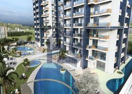 Pool image for: Apartment - 1 bedroom - 1 bathroom for sale in Samana Waves - Jumeirah Village Circle - Dubai, Image 1