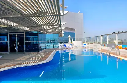 Apartment - 3 Bedrooms - 4 Bathrooms for rent in Golden Falcon Tower - Hamdan Street - Abu Dhabi