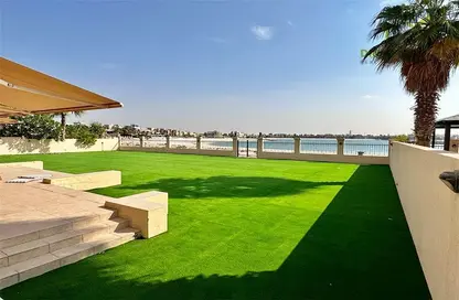 Garden image for: Villa - 5 Bedrooms - 7 Bathrooms for rent in Al Hamra Village Villas - Al Hamra Village - Ras Al Khaimah, Image 1