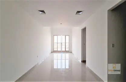 Empty Room image for: Apartment - 2 Bedrooms - 3 Bathrooms for sale in Spanish Andalusian - Canal Residence - Dubai Sports City - Dubai, Image 1