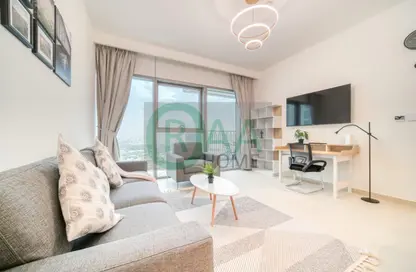 Living Room image for: Apartment - 1 Bedroom - 1 Bathroom for rent in Downtown Views II Tower 3 - Downtown Views II - Downtown Dubai - Dubai, Image 1