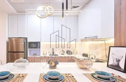 Kitchen image for: Apartment - 1 Bedroom - 2 Bathrooms for sale in Vita Grande - Jumeirah Village Circle - Dubai, Image 1