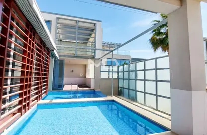Pool image for: Villa - 5 Bedrooms - 7 Bathrooms for rent in Building F - Al Zeina - Al Raha Beach - Abu Dhabi, Image 1