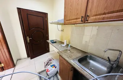 Kitchen image for: Villa - 1 Bathroom for rent in Al Rawda Arjaan By Rotana - Al Wahda - Abu Dhabi, Image 1