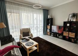 Living Room image for: Apartment - 1 bedroom - 2 bathrooms for sale in Regent Court - Jumeirah Village Circle - Dubai, Image 1