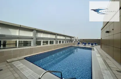 Pool image for: Apartment - 2 Bedrooms - 2 Bathrooms for rent in Royal Tower - Hamdan Street - Abu Dhabi, Image 1