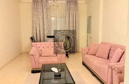 شقة - غرفة نوم - 2 حمامات للايجار في أورينت تاور 1 - أورينت تاور - البستان - عجمان