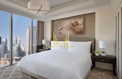 Room / Bedroom image for: Apartment - 1 Bedroom - 2 Bathrooms for rent in Kempinski BLVD - Downtown Dubai - Dubai, Image 1