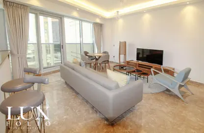 Living / Dining Room image for: Apartment - 1 Bedroom - 2 Bathrooms for rent in Orra Harbour Residences and Hotel Apartments - Dubai Marina - Dubai, Image 1