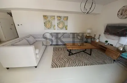 Living Room image for: Villa - 3 Bedrooms - 5 Bathrooms for rent in Zinnia - Damac Hills 2 - Dubai, Image 1