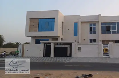 Outdoor Building image for: Townhouse - 5 Bedrooms for sale in Al Zaheya Gardens - Al Zahya - Ajman, Image 1