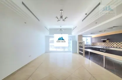 Empty Room image for: Apartment - 1 Bedroom - 2 Bathrooms for rent in Al Noon Residence - Al Barsha 1 - Al Barsha - Dubai, Image 1