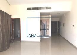 Empty Room image for: Studio - 1 bathroom for rent in Madison Residences - Majan - Dubai, Image 1