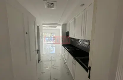Kitchen image for: Apartment - 1 Bathroom for sale in Al Ghaf 1 - Arjan - Dubai, Image 1