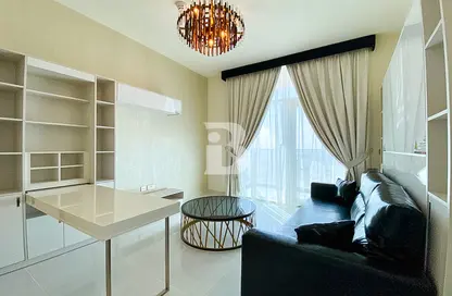 Living Room image for: Apartment - 1 Bathroom for sale in Miraclz Tower by Danube - Arjan - Dubai, Image 1