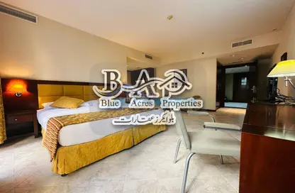 Room / Bedroom image for: Apartment - 1 Bathroom for rent in Mina Road - Tourist Club Area - Abu Dhabi, Image 1