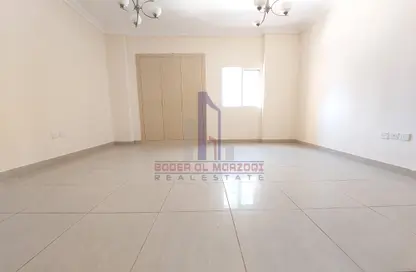 Empty Room image for: Apartment - 1 Bathroom for rent in Al Fajir Tower - Al Nahda - Sharjah, Image 1