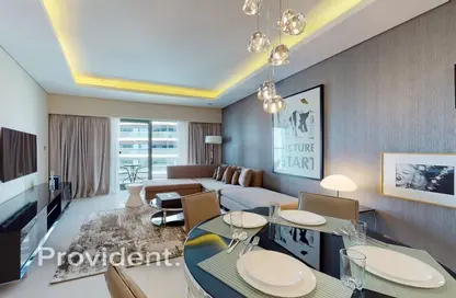 Living / Dining Room image for: Apartment - 1 Bedroom - 2 Bathrooms for rent in Tower B - DAMAC Towers by Paramount - Business Bay - Dubai, Image 1
