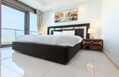 صورة لـ غرفة- غرفة النوم شقة - 2 غرف نوم - 2 حمامات للايجار في فندق ومساكن برج باراماونت - الخليج التجاري - دبي ، صورة رقم 1