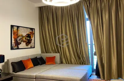 Room / Bedroom image for: Apartment - 1 Bedroom - 2 Bathrooms for sale in Golf Promenade 2B - Golf Promenade - DAMAC Hills - Dubai, Image 1