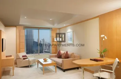 Living / Dining Room image for: Hotel  and  Hotel Apartment - 1 Bedroom - 2 Bathrooms for rent in The Carlton Downtown Hotel - Sheikh Zayed Road - Dubai, Image 1