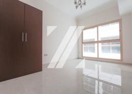 Empty Room image for: Studio - 1 bathroom for rent in Sooma Residence - Majan - Dubai, Image 1