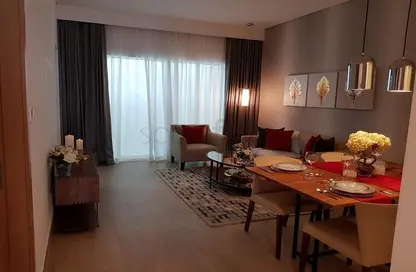 Living / Dining Room image for: Apartment - 1 Bedroom - 2 Bathrooms for sale in Genesis by Meraki - Arjan - Dubai, Image 1